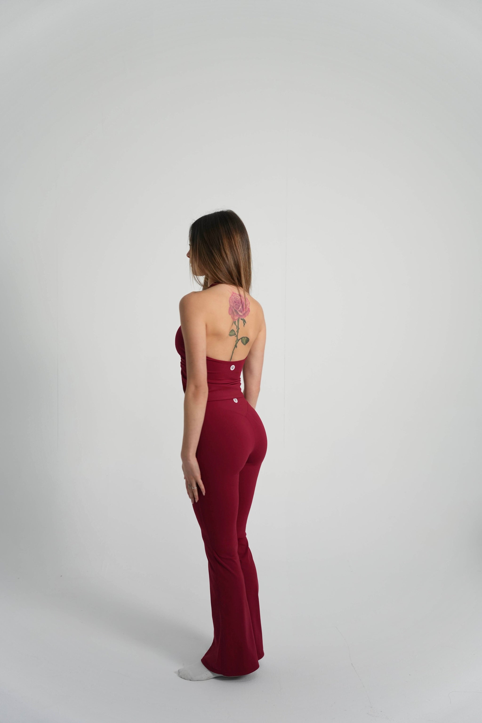 pantalon largo flare mujer deporte color granate